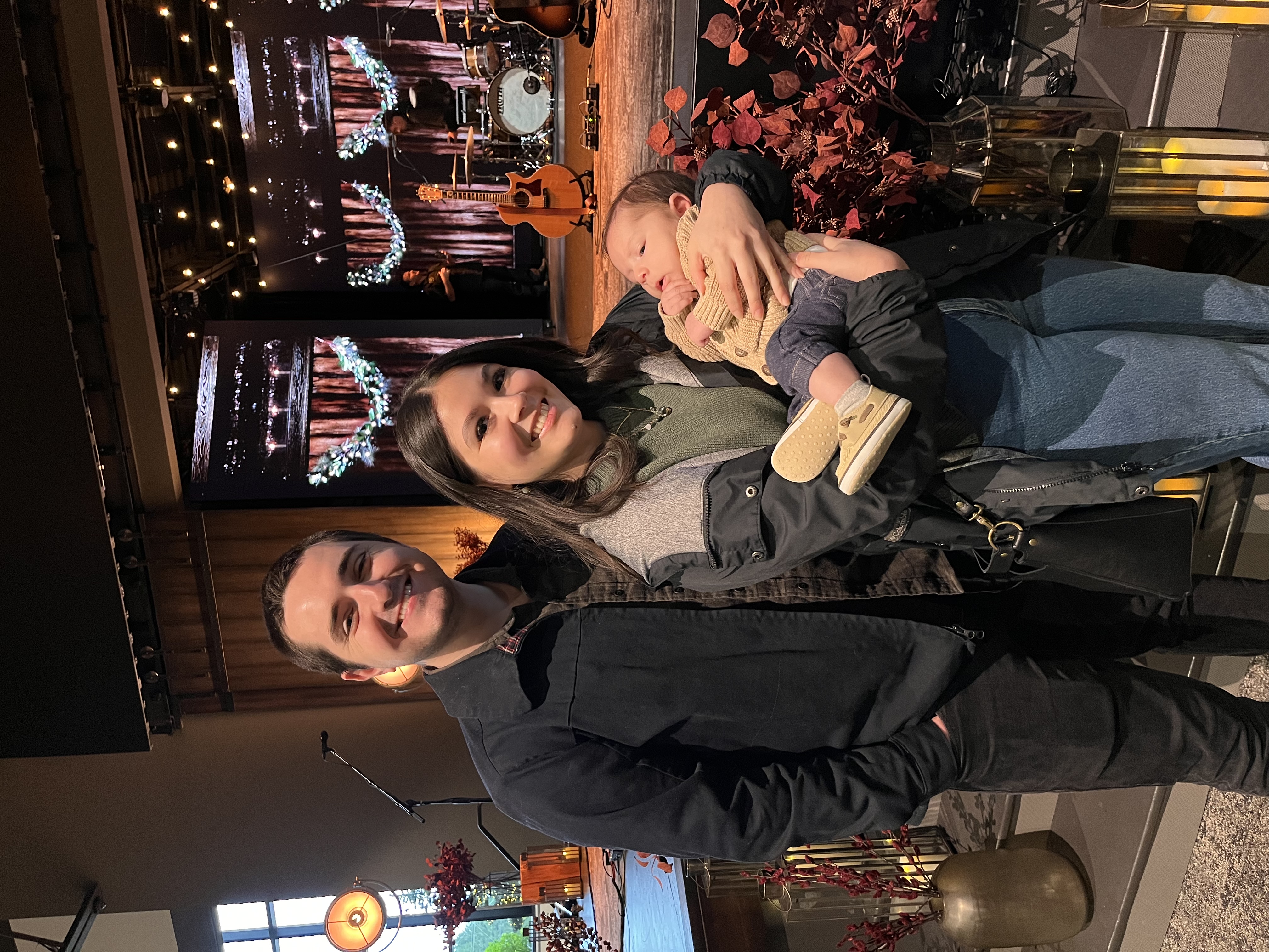 Nick and Talia celebrating Isaiah's baptism in November 2024